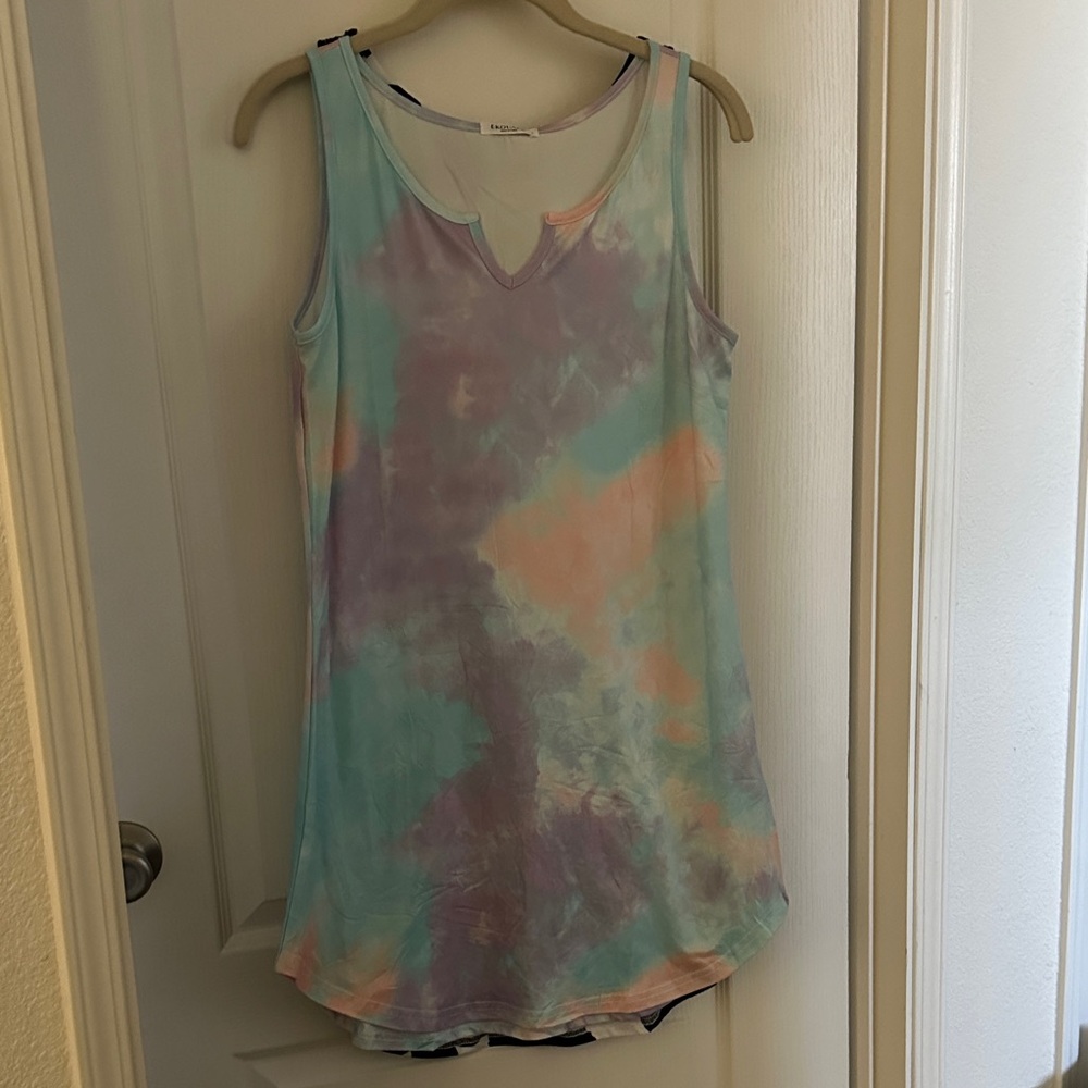 1 blue and white flower dress and one tye dye dress